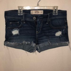 Ripped dark wash jean shorts
